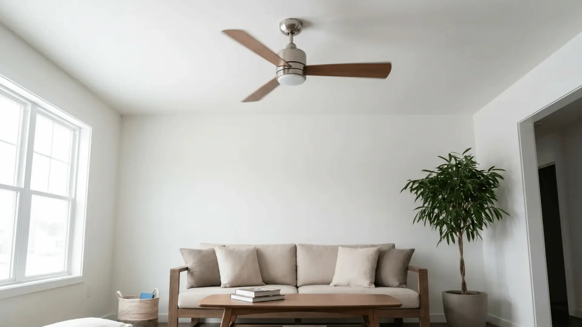 Ceiling fan operating in a residential room, illustrating a common household appliance with low electricity use