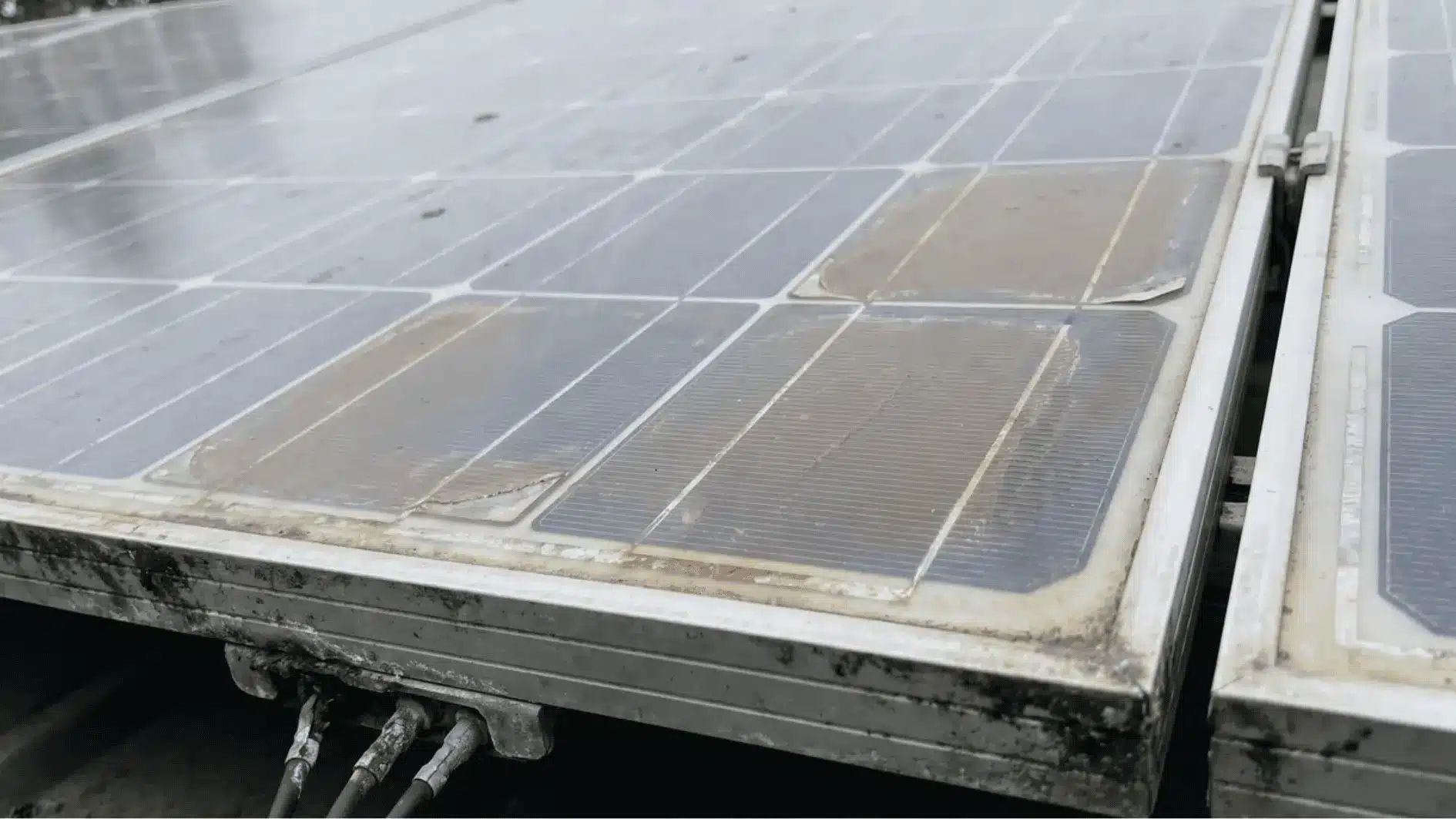 Close-up of solar panel cells and frame exposed to outdoor conditions