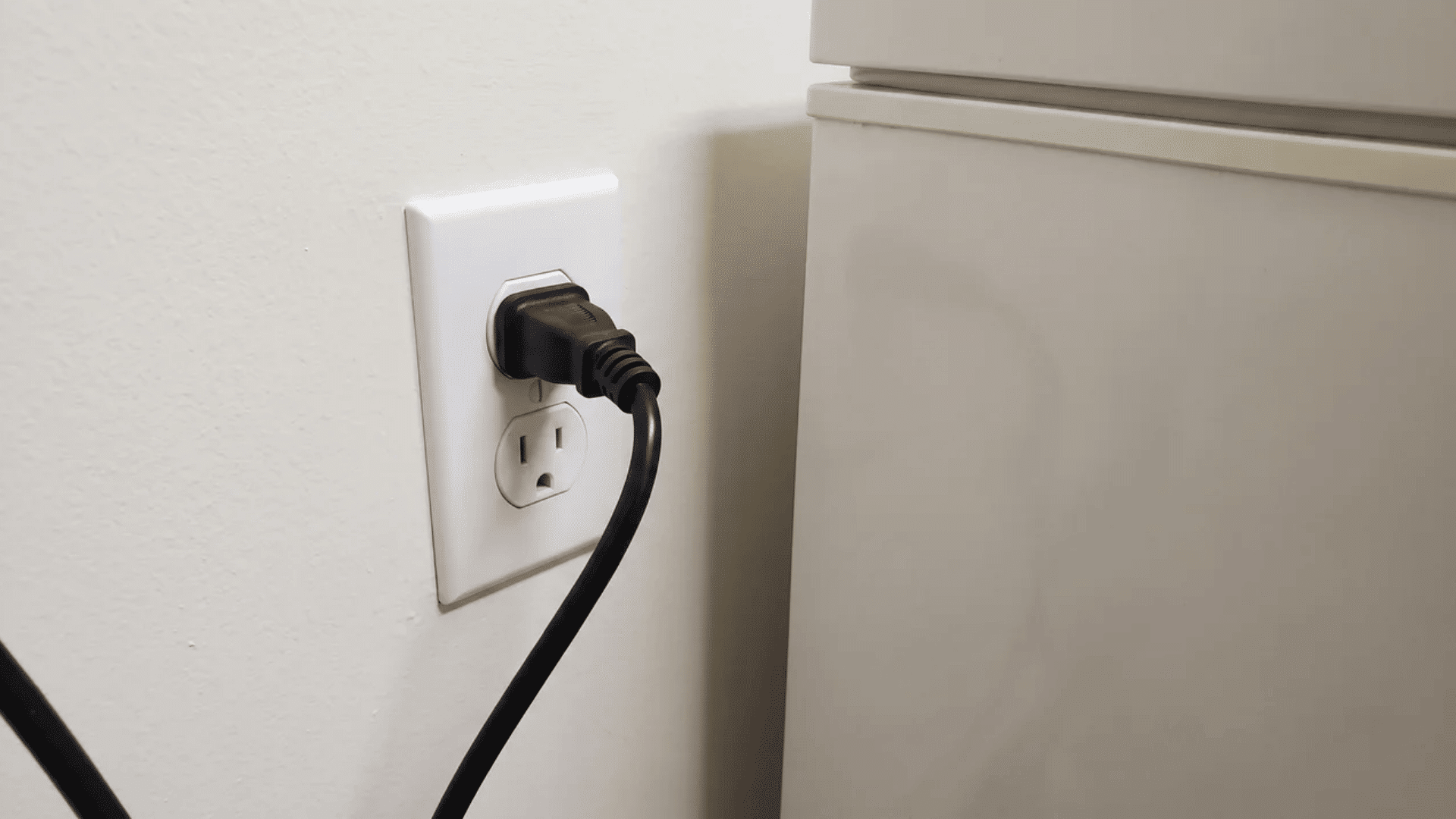 single wall outlet with only a freezer cord plugged in
