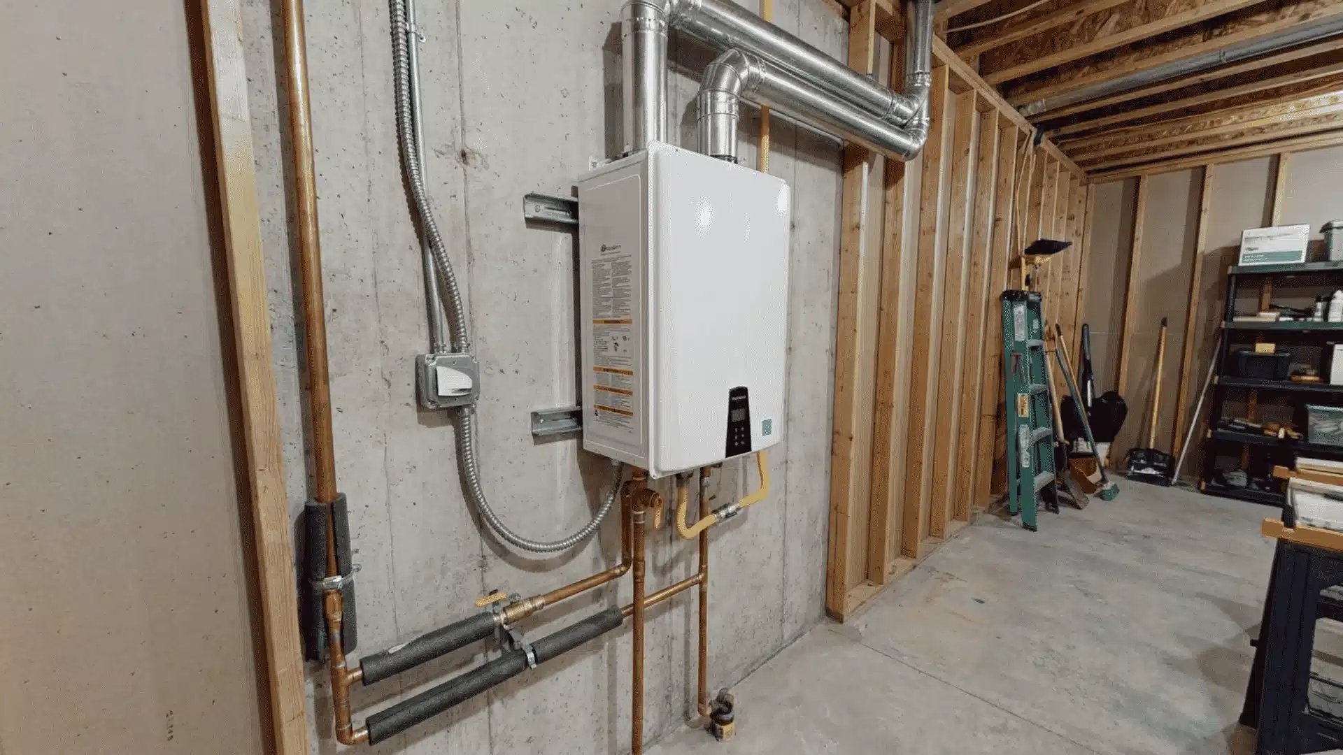 Wall-mounted tankless water heater with gas line, plumbing, electrical, and vent connections