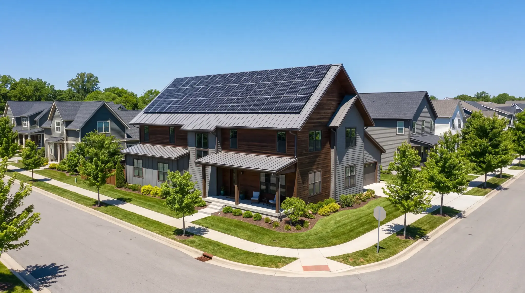 Modern American home with solar panels installed across the sun-facing roof